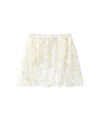 The Soleá White/Yellow Skirt is a white mesh skirt with an elastic waistband, adorned with hand-sewn embroidered yellow and white daisies throughout.