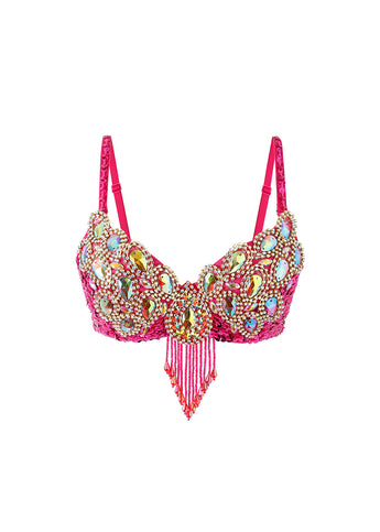 The "Vixen - Rosé - Bottom" features pink rhinestones, large gold and iridescent gemstones, and red beaded fringe—perfect as an eye-catching addition to your festival outfit.