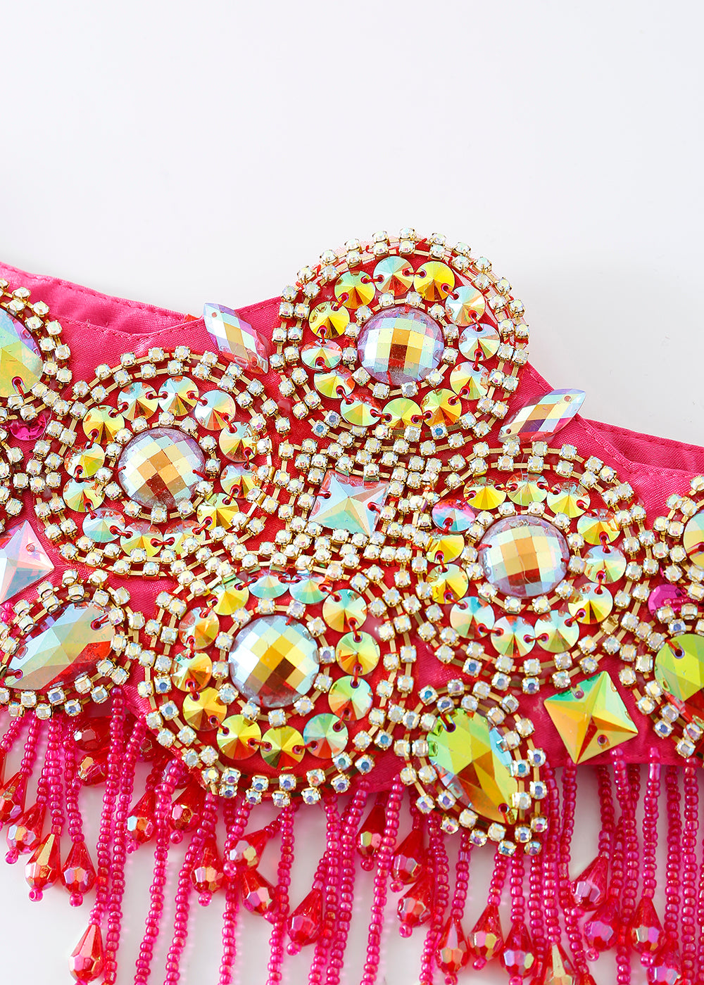 Close-up of ornate gold and multicolored beadwork on the Vixen - Rosé - Bottom with pink rhinestone details and pink beaded fringe—perfect for rave or festival outfits.