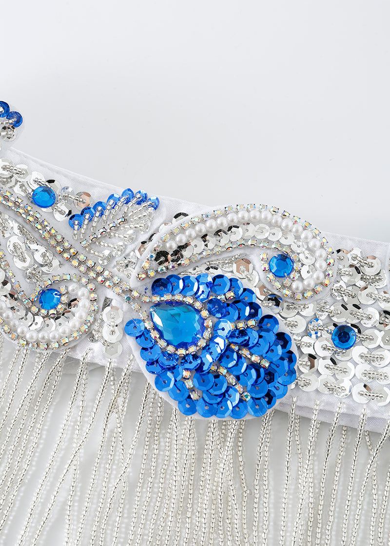 Close-up of the Imperya - Silver - Bottom, featuring blue and silver sequins, beads, rhinestones, and silver fringe—ideal as a standout accent for rave festival wear from ChillFit Rave.