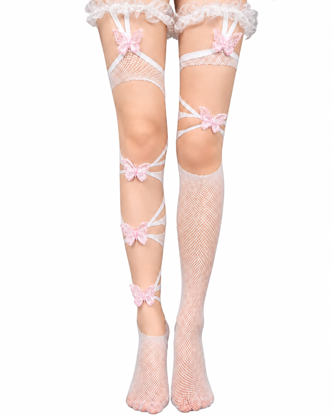 A person wearing the Butterfly Trap Pink-Thigh High hosiery—white fishnet thigh highs featuring pink butterfly decorations and white lace at the top—stands against a white background.