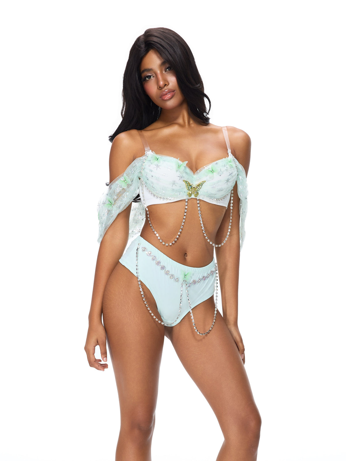 Woman wearing the Dream from the Sky- Full Set- Green, featuring pearl chains and sheer off-shoulder sleeves, against a white background.