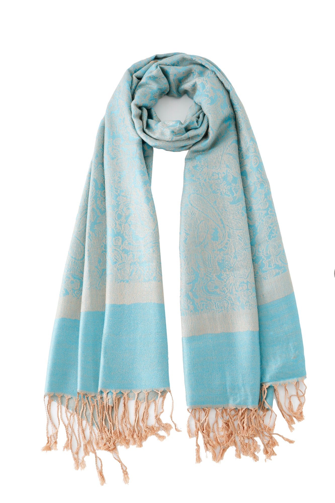 Pashmina - Ice Blue Paisley: ice blue scarf with beige paisley patterns and fringed ends, draped in a loop against a white background.