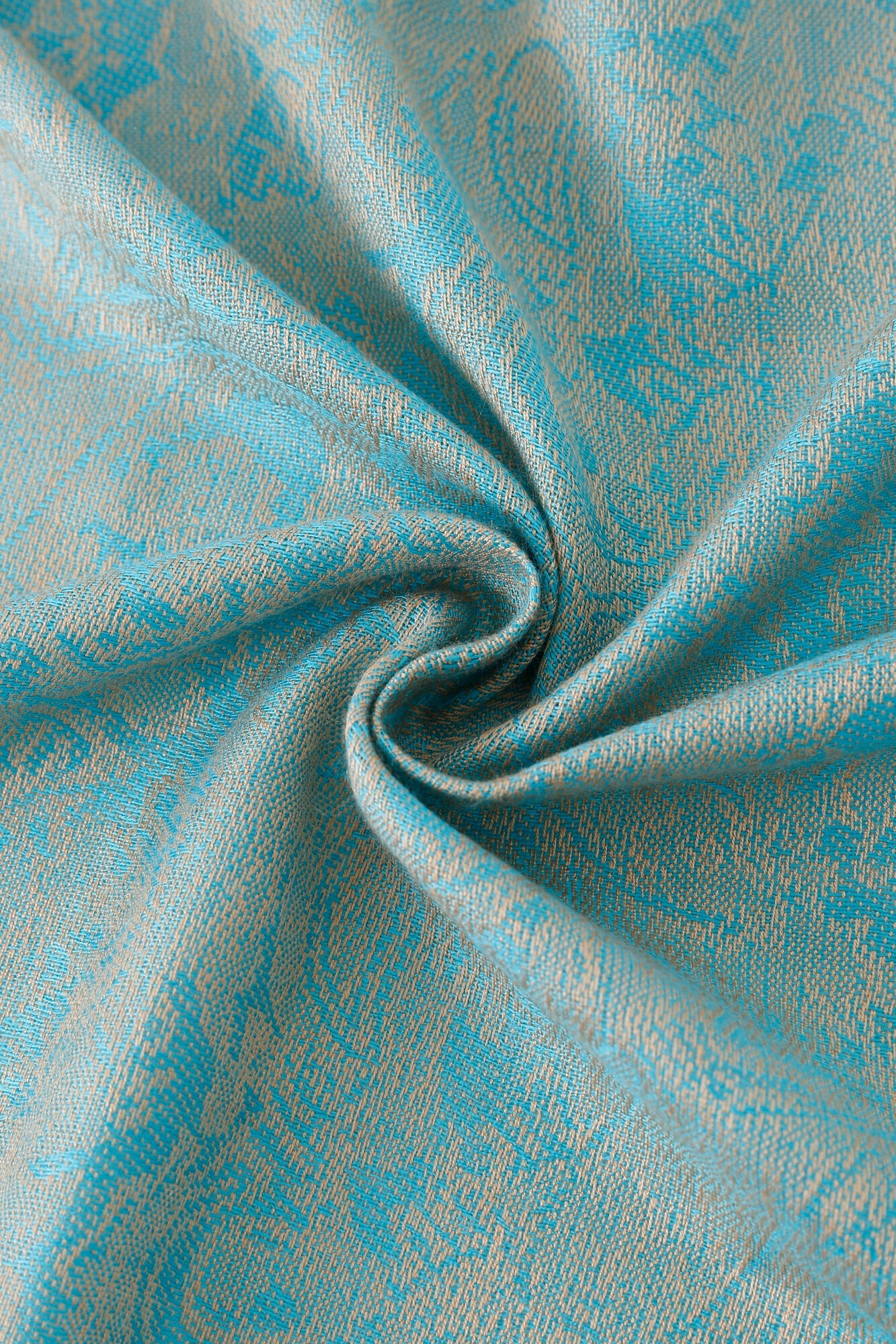 Close-up of the Pashmina - Ice Blue Paisley, highlighting its detailed texture and woven paisley design with a central twist.