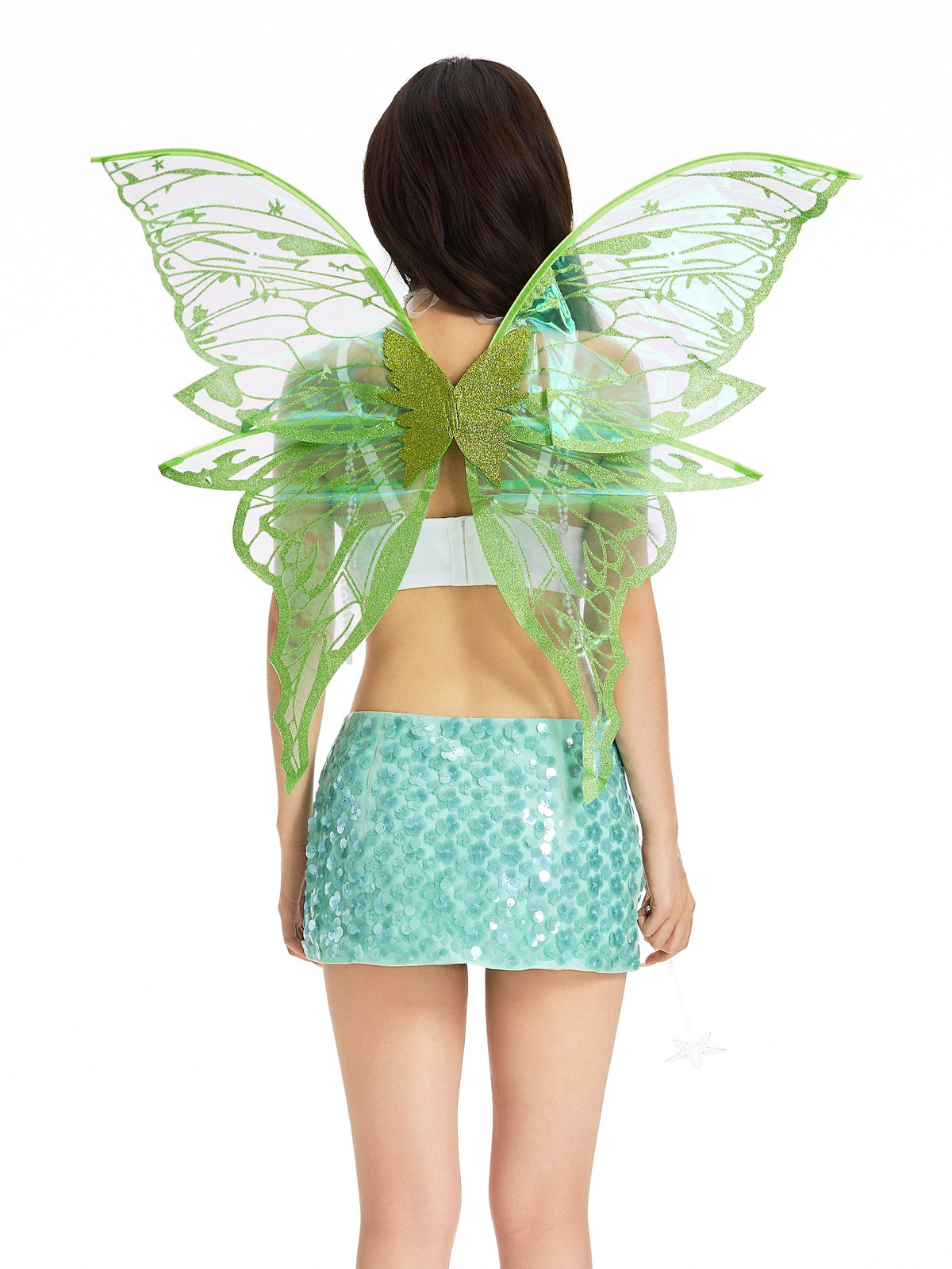 A person wearing “The Fae - Posy&Gossamer Green” fairy costume, featuring sparkling green fabric, a rhinestone headpiece, and large wings, is shown from the back against a plain white background.