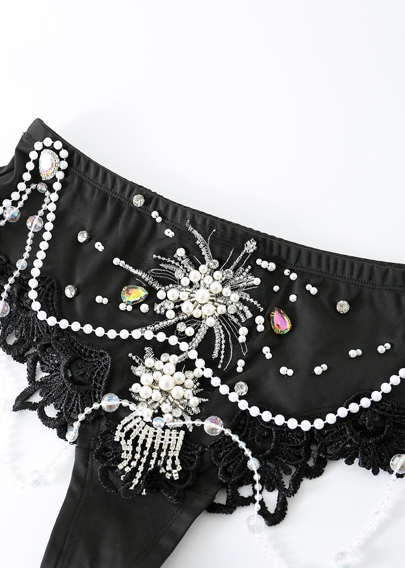 The ECLIPSE - Full Set features black fabric with intricate bead, pearl, and rhinestone embellishments, lace trim, and hanging pearl strands—ideal as a handmade rave outfit or statement bra top for celestial festival wear.