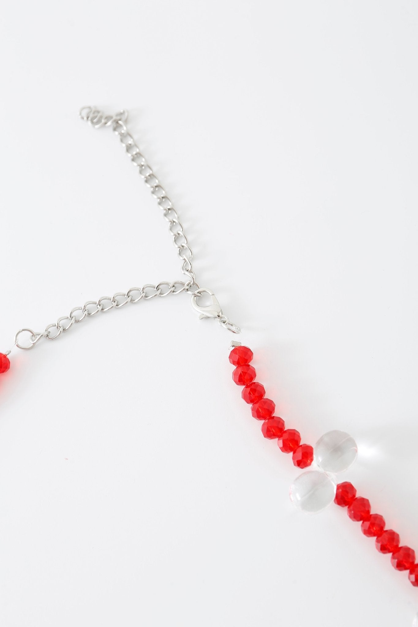 The Poppy w Pashmina- Full Set is elegantly displayed on a white background, making it the perfect accessory to complement a beaded top or add a touch of charm to your Poppy lingerie ensemble.