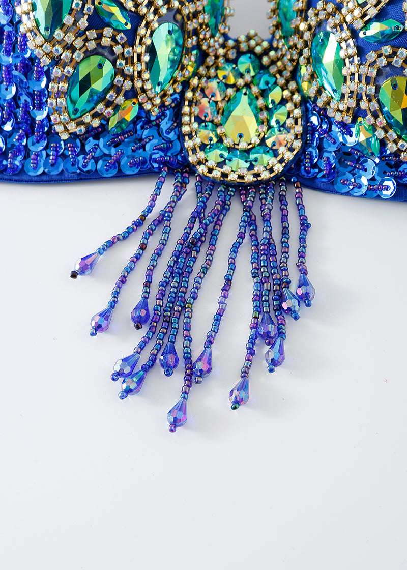 Close-up of the Vixen - Royal Blue - Top featuring blue sequins, rhinestones, green and gold accents, and dangling beaded fringe—perfect for rave and festival wear.